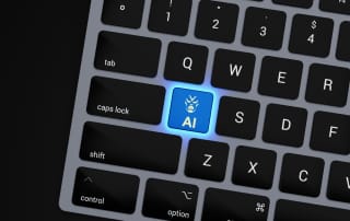 a-close-up-of-a-keyboard-with-a-blue-button